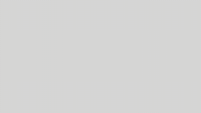 A Close Up Of A Man 'S Face With A Beard Smiling GIF