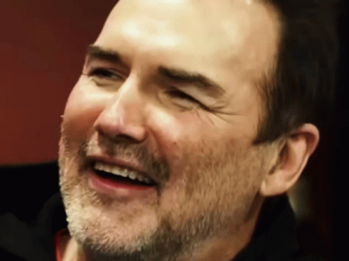 A Close Up Of A Man 'S Face With A Beard GIF