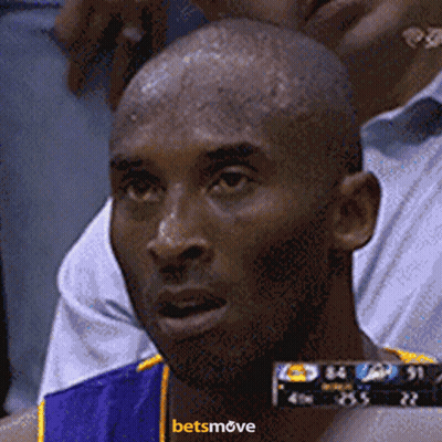 A Close Up Of A Man 'S Face With A Betsmove Logo Behind Him GIF
