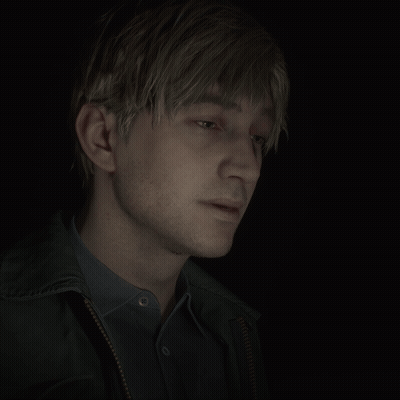 A Close Up Of A Man 'S Face With A Black Background GIF