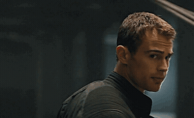A Close Up Of A Man 'S Face With A Black Jacket On GIF