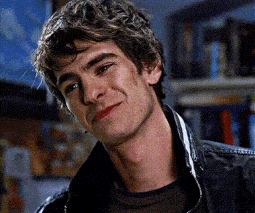 A Close Up Of A Man 'S Face With A Black Jacket On GIF