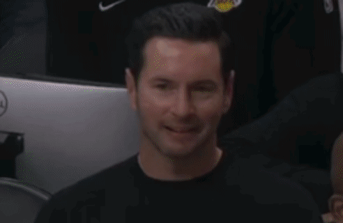 A Close Up Of A Man 'S Face With A Black Shirt On GIF