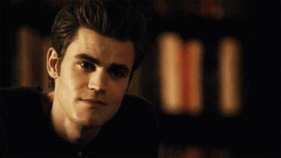 A Close Up Of A Man 'S Face With A Blurred Background GIF
