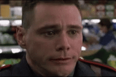 A Close Up Of A Man 'S Face With A Blurred Background GIF