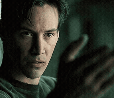 A Close Up Of A Man 'S Face With A Blurred Background GIF