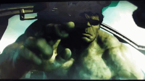 A Close Up Of A Man 'S Face With A Blurred Background GIF