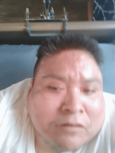 A Close Up Of A Man 'S Face With A Blurred Background GIF