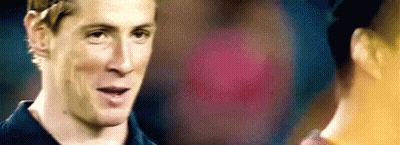 A Close Up Of A Man 'S Face With A Blurry Background . GIF