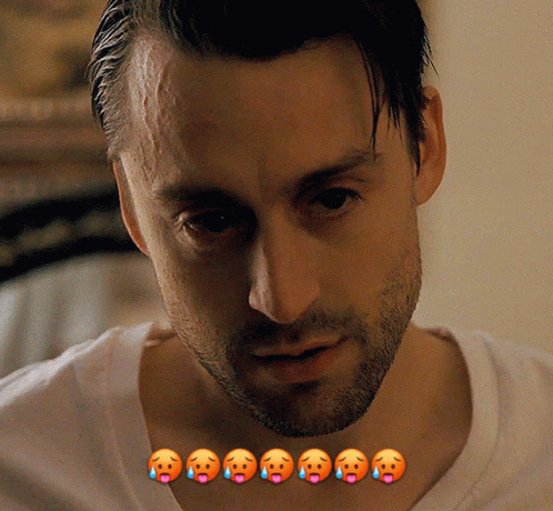 A Close Up Of A Man 'S Face With A Bunch Of Smiley Faces On His Neck GIF