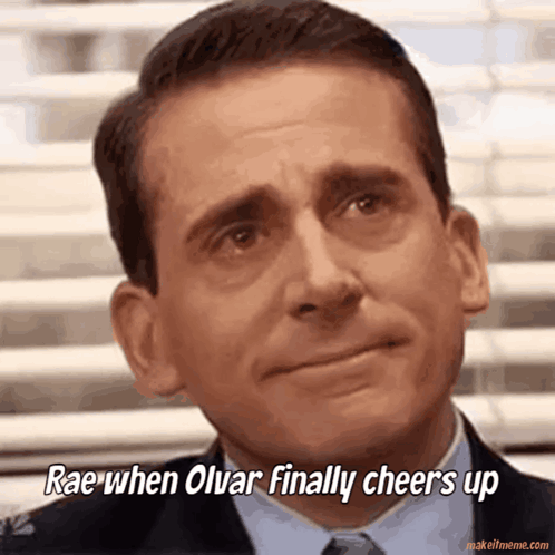 A Close Up Of A Man 'S Face With A Caption That Says Rae When Olvar Finally Cheers Up GIF