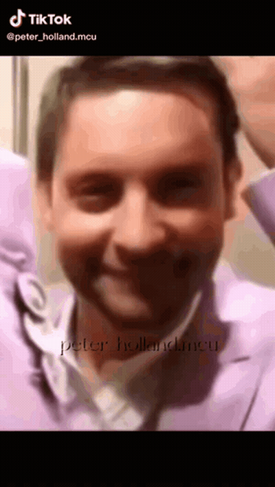 A Close Up Of A Man 'S Face With A Caption That Says Tik Tok GIF