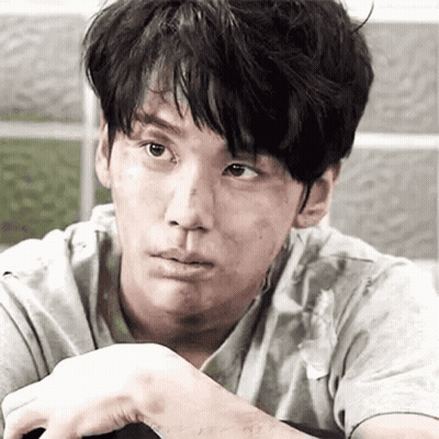 A Close Up Of A Man 'S Face With A Dirty Face And A Dirty Shirt . GIF