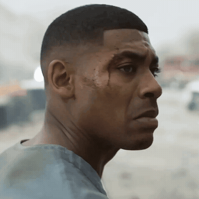 A Close Up Of A Man 'S Face With A Few Spots Of Blood On It GIF