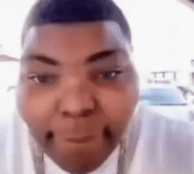 A Close Up Of A Man 'S Face With A Funny Face . GIF