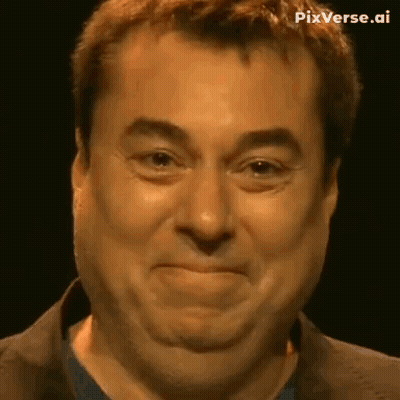 A Close Up Of A Man 'S Face With A Funny Face . GIF
