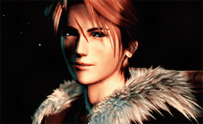 A Close Up Of A Man 'S Face With A Fur Coat Around His Neck GIF