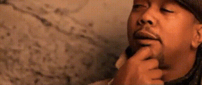A Close Up Of A Man 'S Face With A Hat On GIF