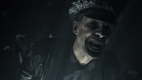 A Close Up Of A Man 'S Face With A Hat That Says ' A ' On It GIF