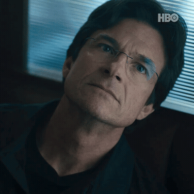 A Close Up Of A Man 'S Face With A Hbo Logo In The Background GIF