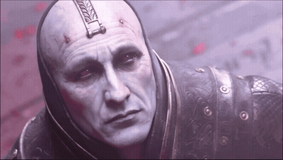 A Close Up Of A Man 'S Face With A Helmet On GIF