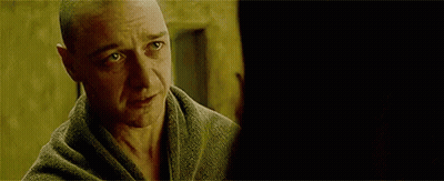 A Close Up Of A Man 'S Face With A Hole In His Head . GIF