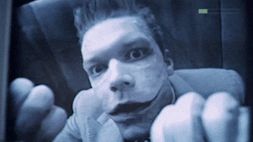A Close Up Of A Man 'S Face With A Loading Bar Visible GIF
