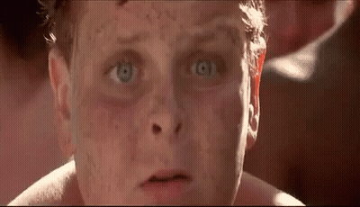 A Close Up Of A Man 'S Face With A Lot Of Freckles On It . GIF
