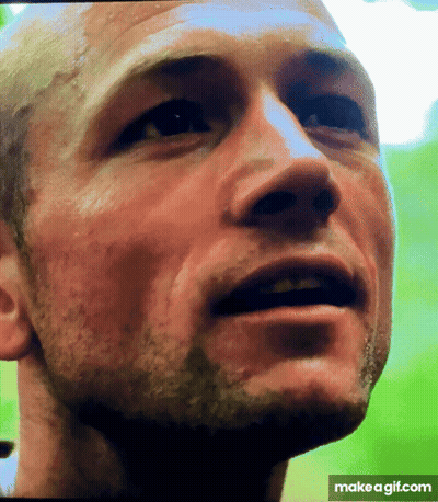 A Close Up Of A Man 'S Face With A Make A Gif.com Watermark GIF