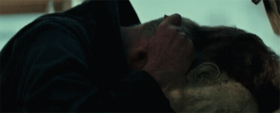 A Close Up Of A Man 'S Face With A Mask On It GIF