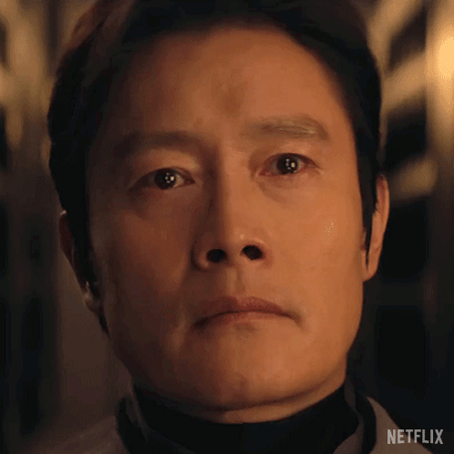 A Close Up Of A Man 'S Face With A Netflix Logo On The Bottom GIF