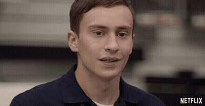 A Close Up Of A Man 'S Face With A Netflix Logo On The Bottom GIF