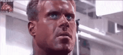 A Close Up Of A Man 'S Face With A Picture Of A Man In The Background That Says Follow GIF