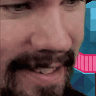 A Close Up Of A Man 'S Face With A Pink And Blue Background GIF