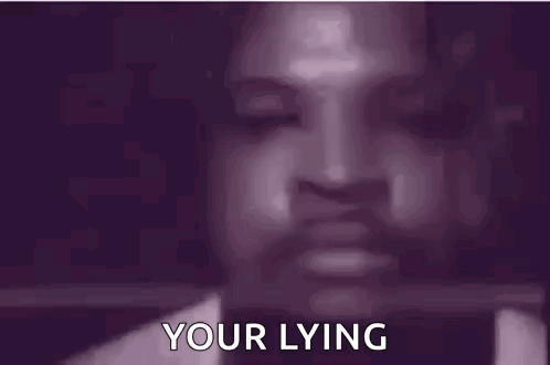 A Close Up Of A Man 'S Face With A Purple Background And The Words `` Your Lying '' . GIF