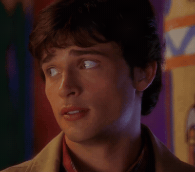 A Close Up Of A Man 'S Face With A Purple Background GIF