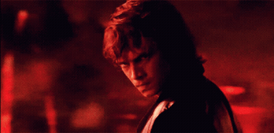 A Close Up Of A Man 'S Face With A Red Background GIF