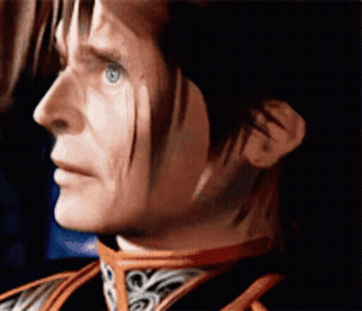 A Close Up Of A Man 'S Face With A Red Collar GIF