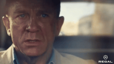 A Close Up Of A Man 'S Face With A Regal Logo On The Bottom Right GIF