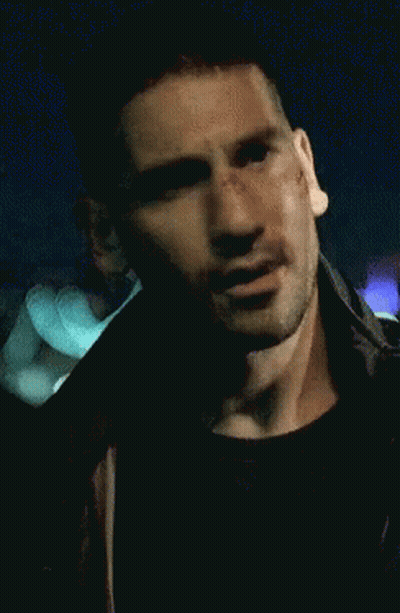 A Close Up Of A Man 'S Face With A Scratch On It GIF