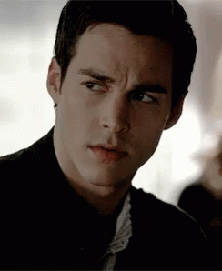 A Close Up Of A Man 'S Face With A Serious Expression GIF