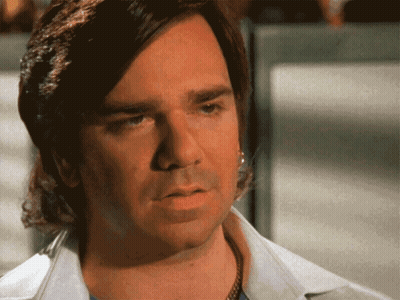 A Close Up Of A Man 'S Face With A Serious Expression GIF