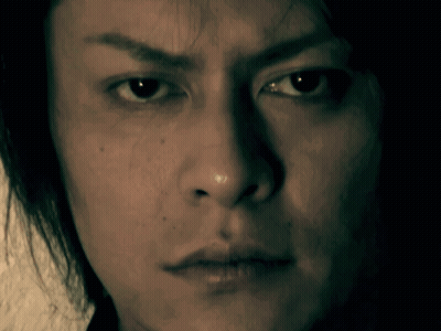 A Close Up Of A Man 'S Face With A Serious Expression GIF