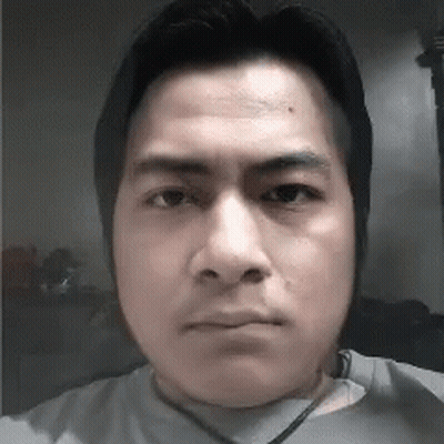 A Close Up Of A Man 'S Face With A Serious Expression GIF