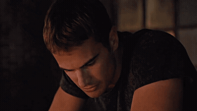 A Close Up Of A Man 'S Face With A Serious Look On His Face GIF