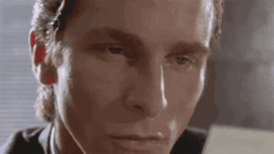 A Close Up Of A Man 'S Face With A Serious Look On His Face GIF