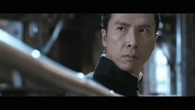 A Close Up Of A Man 'S Face With A Serious Look On His Face GIF