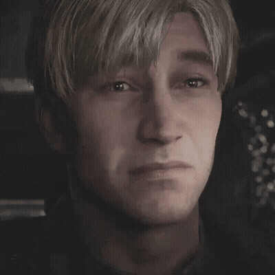 A Close Up Of A Man 'S Face With A Serious Look On His Face GIF