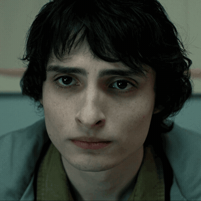 A Close Up Of A Man 'S Face With A Serious Look On His Face GIF