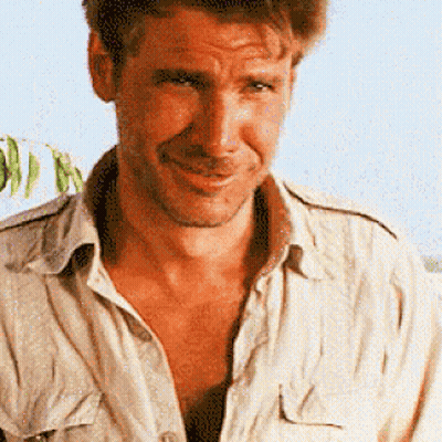 A Close Up Of A Man 'S Face With A Shirt Off GIF